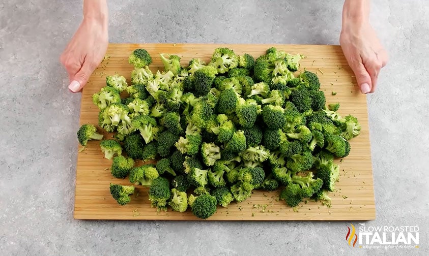 chopped broccoli on wood cutting board