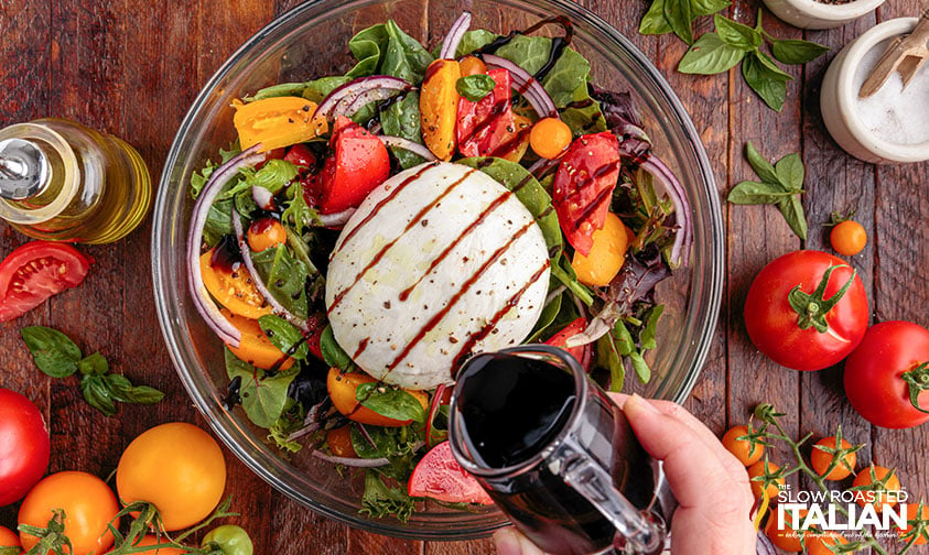 burrata caprese salad drizzled with balsamic glaze