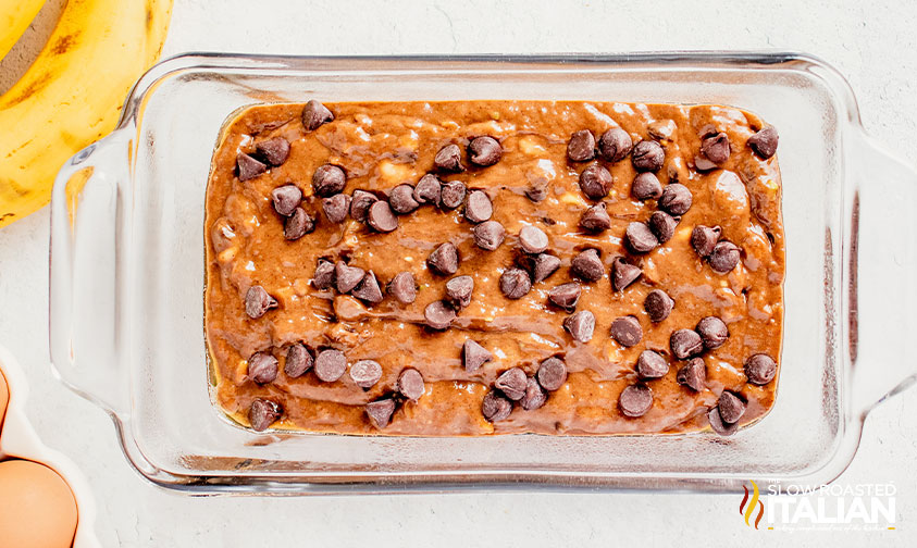 unbaked chocolate avocado banana bread in a loaf pan