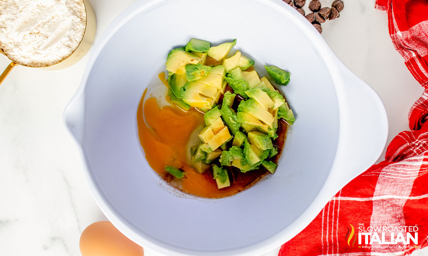 avocado, eggs, and vanilla in a mixing bowl