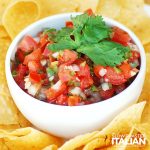 pico de gallo in white bowl with chips