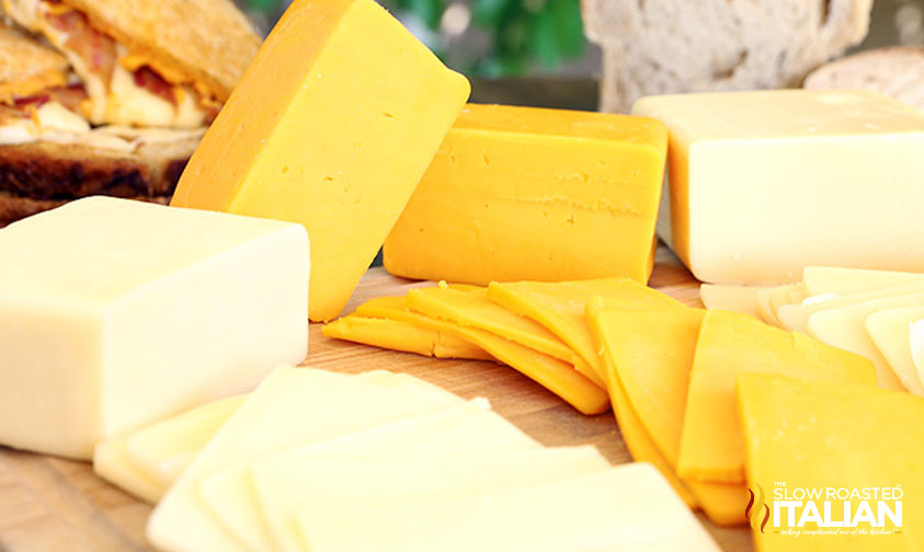 various types of sliced cheese from blocks