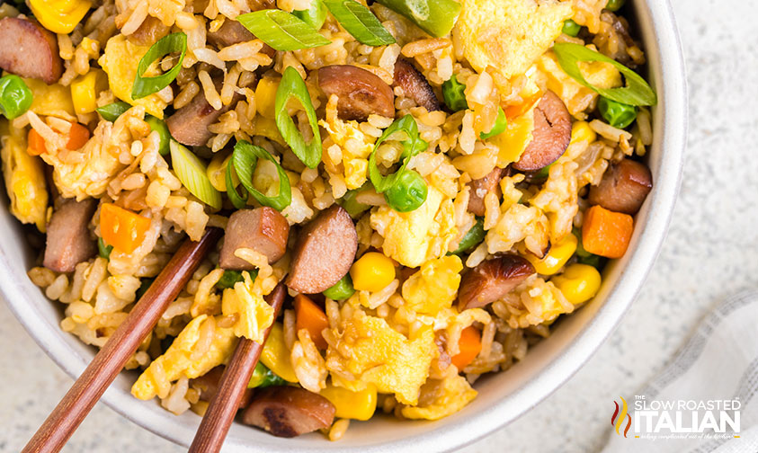 hot dog fried rice with chopsticks