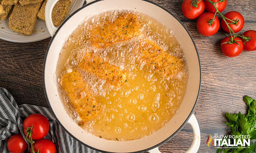 frying mozzarella in a pot of oil