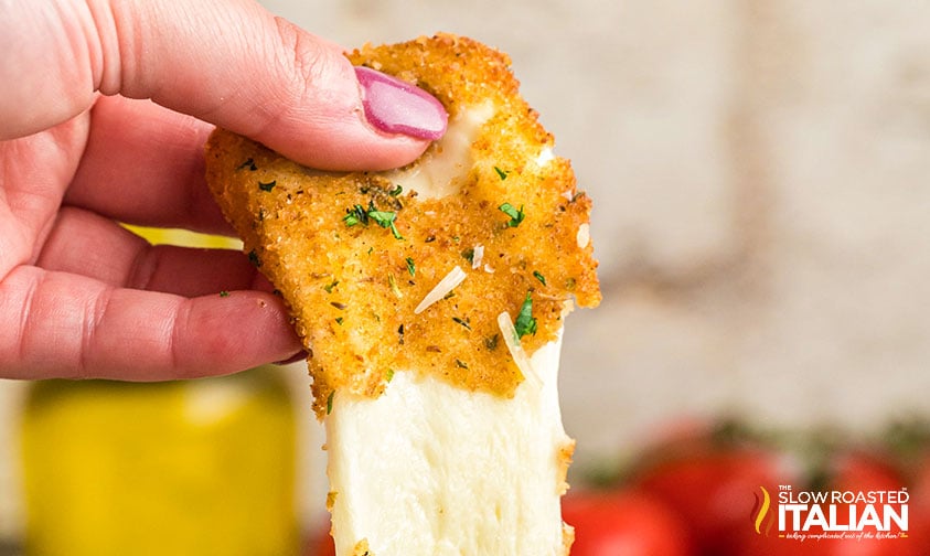 fried mozzarella stick with gooey cheese