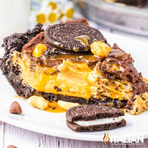 slice of oreo peanut butter pie on a white plate