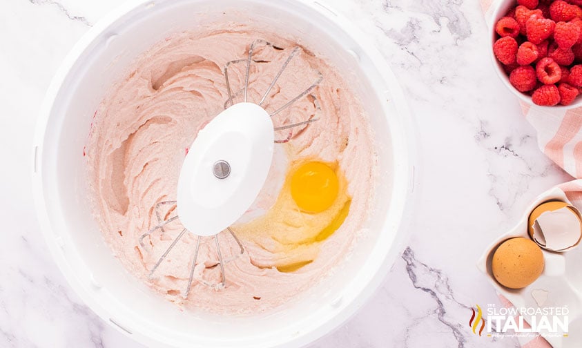 mixing batter for raspberry cupcakes