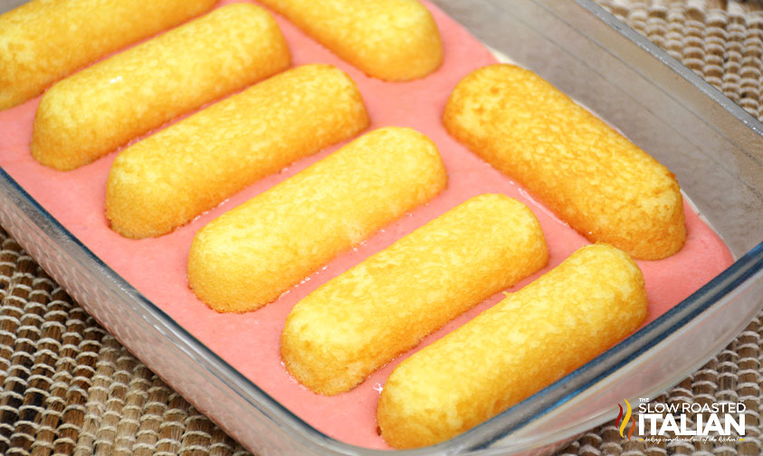 twinkies placed in strawberry cake batter