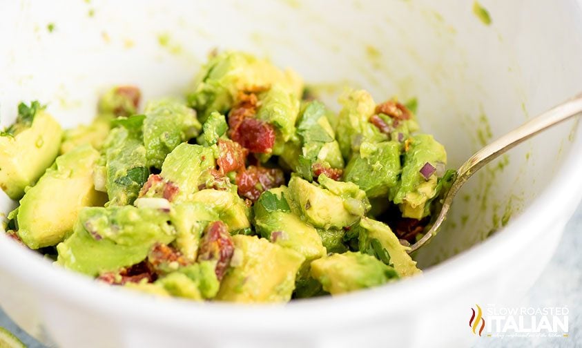 bowl of avocado filling for egg rolls