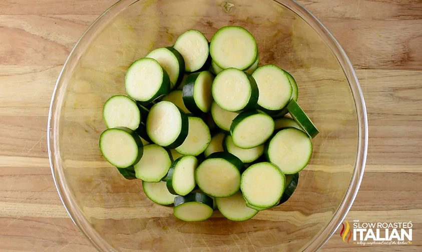 sliced zucchini in glass bowl