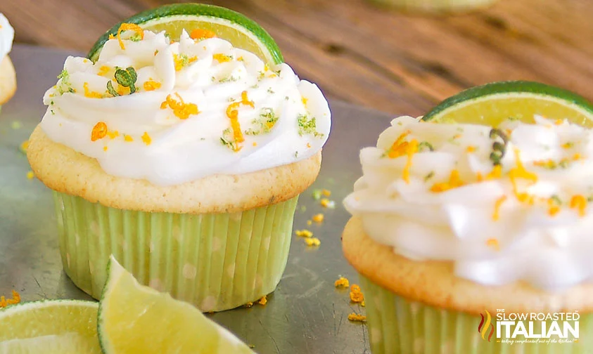 margarita cupcakes topped with slices of lime