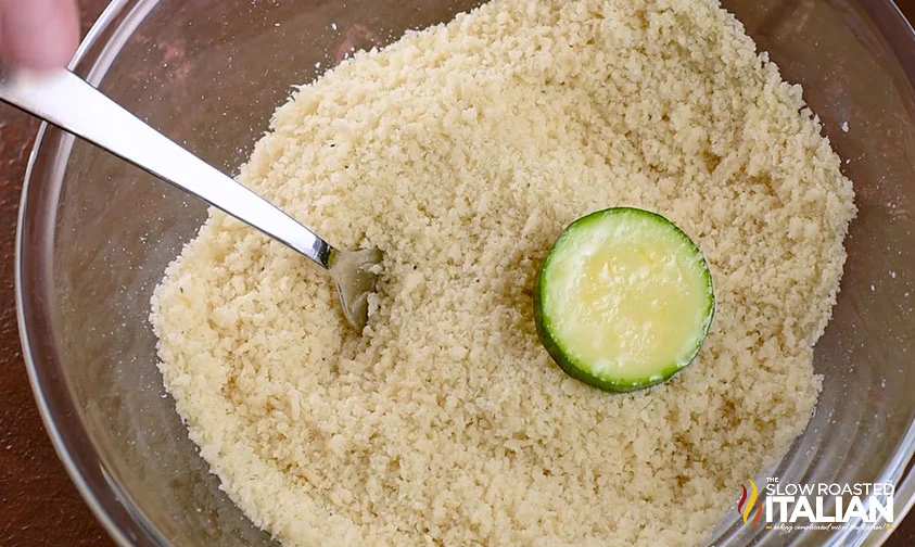 coating zucchini slice with panko breading