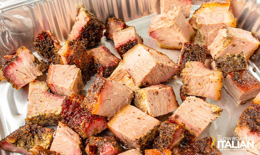 chopped brisket pieces in aluminum pan