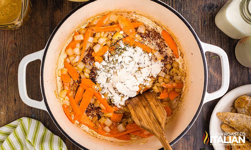 cooking veggies with flour in pot