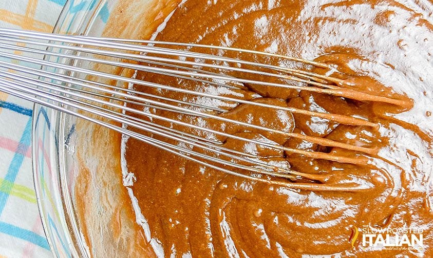 whisking fudge cake batter