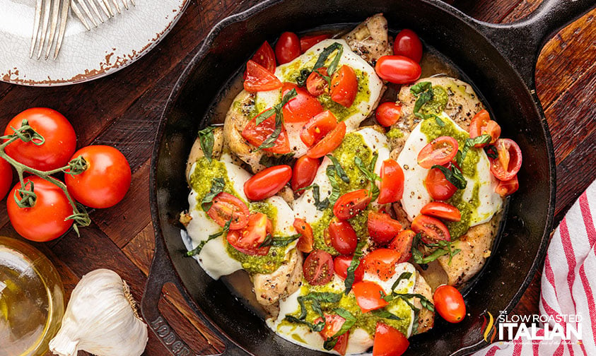 chicken margherita dish in cast iron pan
