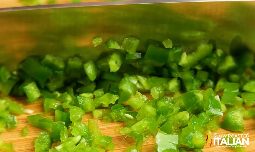 finely chopping jalapeno peppers