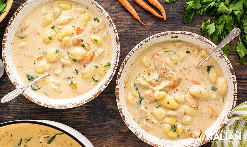 two bowls of copycat olive garden chicken gnocchi soup