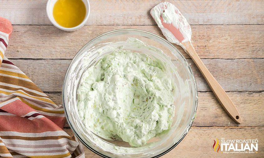 freshly mixed pistachio fluff in bowl