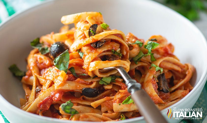 fork twirled in pasta puttanesca