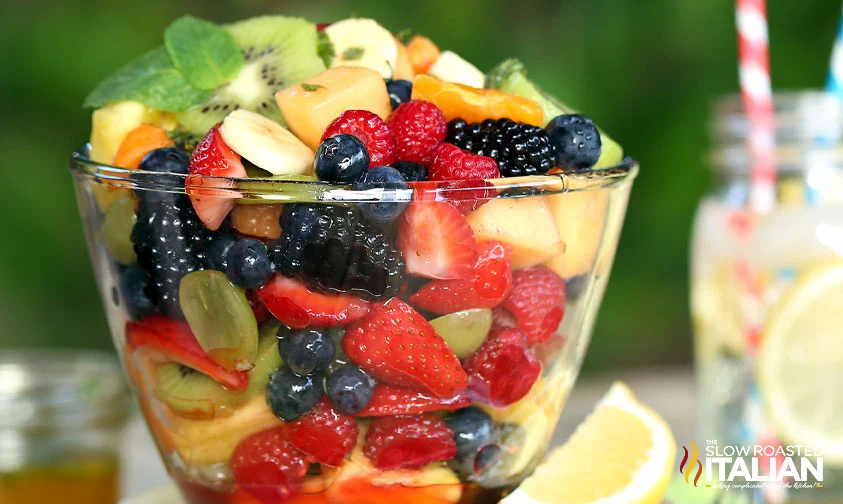 rainbow fruit salad in clear bowl