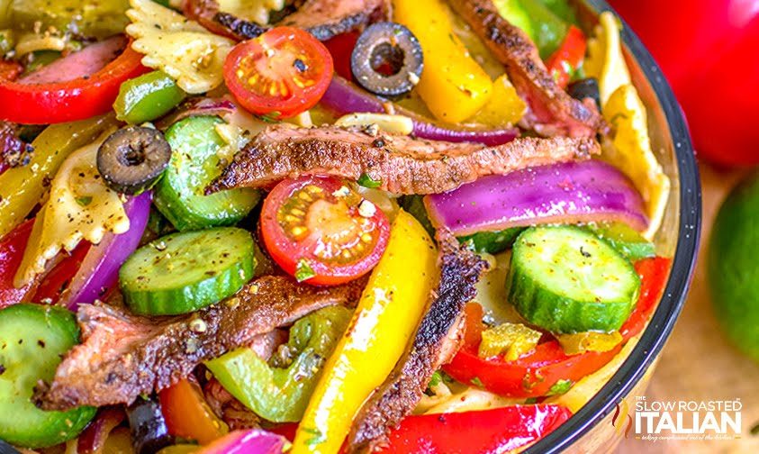 close up: steak fajita salad with bowtie pasta