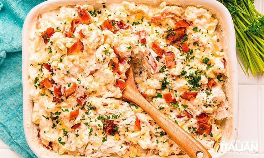 serving cheesy ranch pasta with chicken and bacon