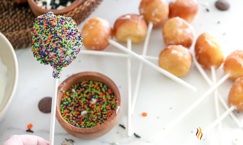 donut hole cake pop coated in sprinkles