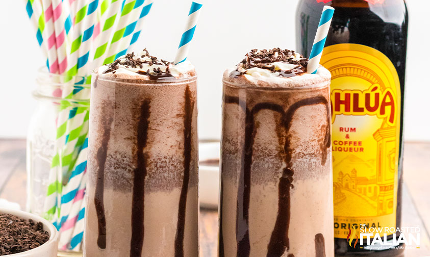 two blended mudslides with straws