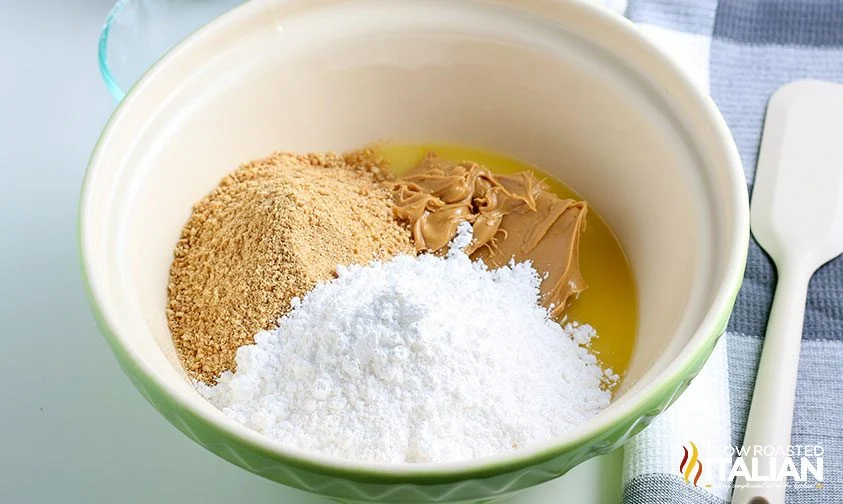 powdered sugar, graham cracker crumbs, pb, and melted butter in bowl