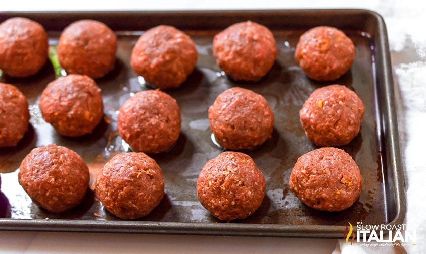tex mex meatballs on a greased baking sheet