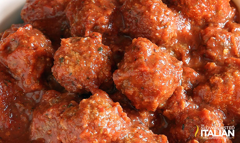 closeup of crockpot of meatballs and marinara