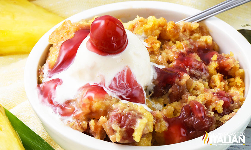 cherry pineapple dump cake in a bowl