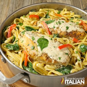 Tuscan garlic chicken linguine in a skillet