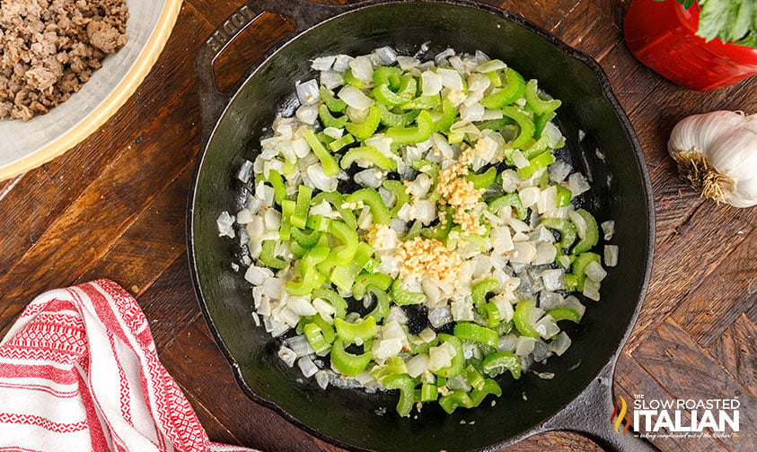chopped onion, celery, and garlic in cast iron skillet