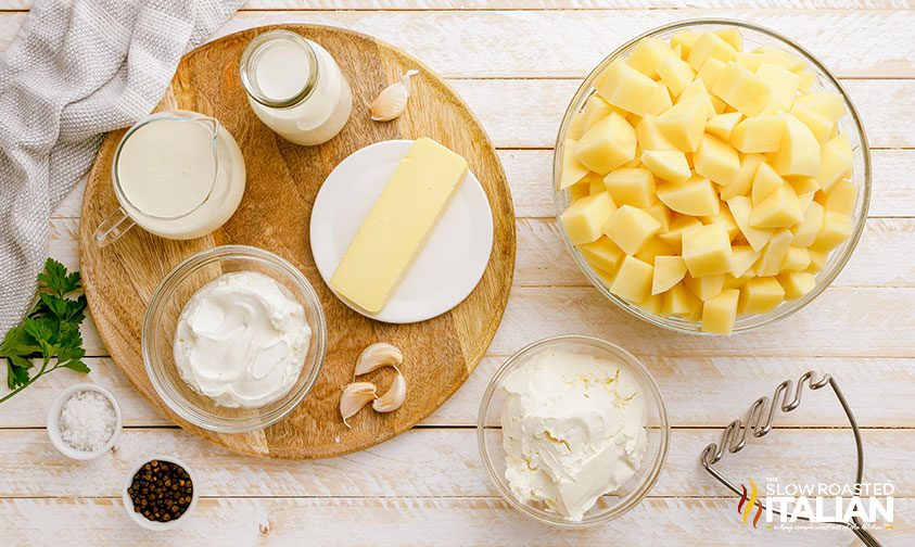 prepped ingredients for mashed potatoes in slow cooker