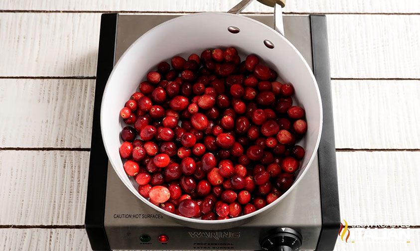 fresh cranberries in a saucepan