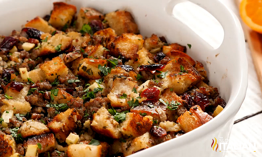 sausage apple cranberry sourdough stuffing in casserole dish