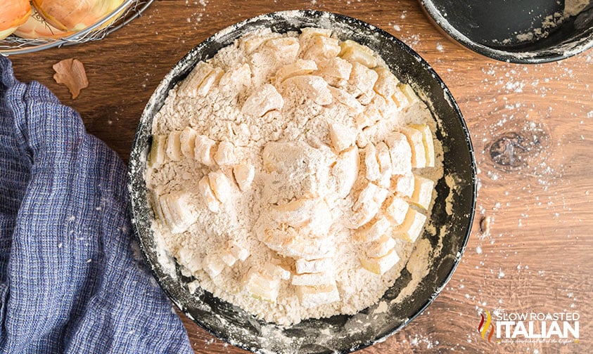 sliced onion dredged in flour