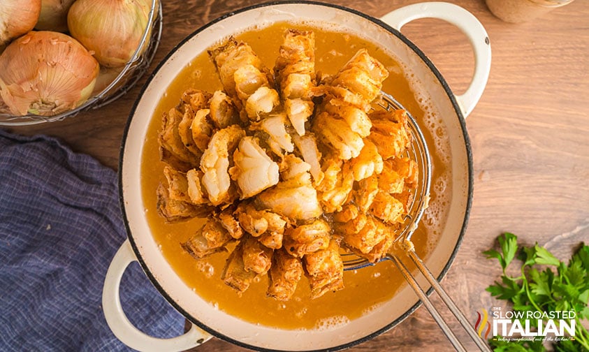 frying bloomin onion in a pot