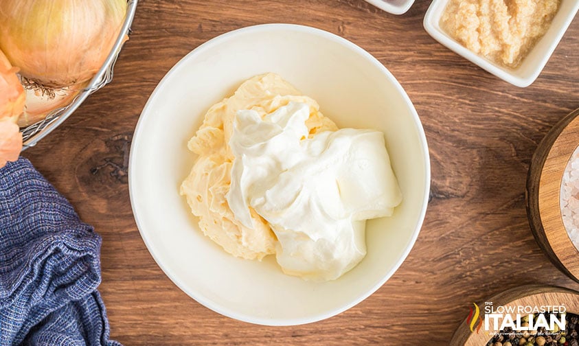 mayo and sour cream in mixing bowl