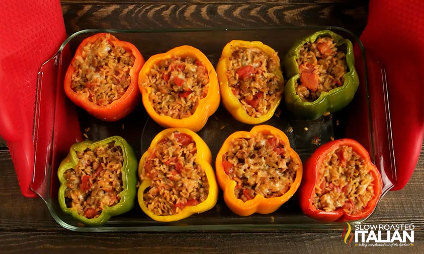 italian stuffed peppers in a baking dish