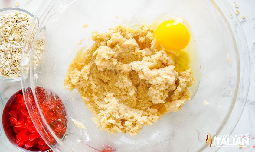 mixing dough for cherry chocolate chip cookies