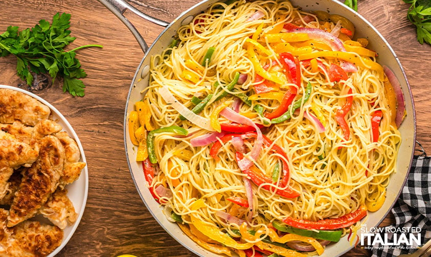 cooked pasta added to skillet with veggies