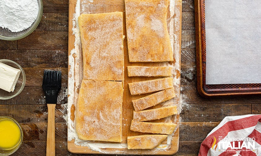 cutting dough into sticks