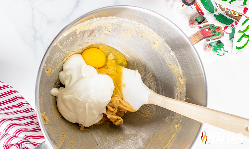 butter, sugar, eggs and sour cream in mixing bowl