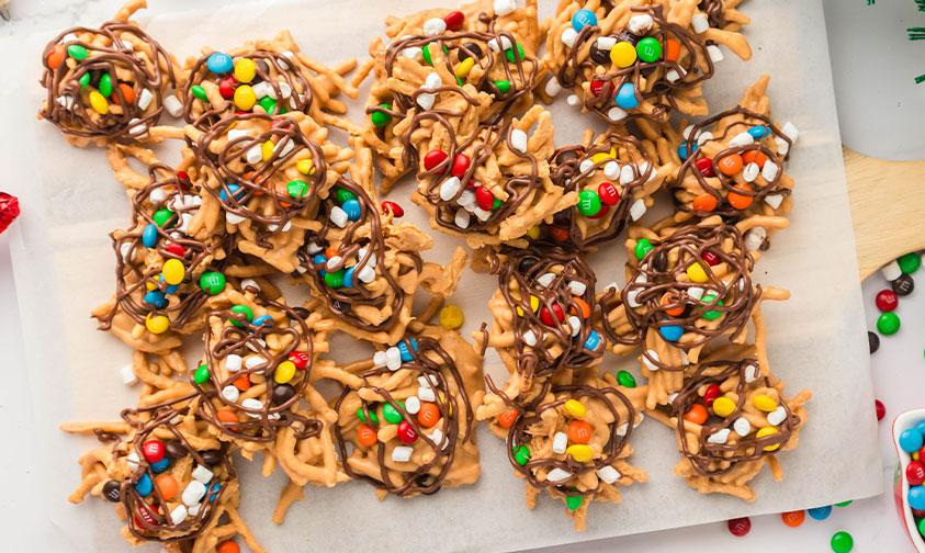 haystack cookies stacked on parchment paper