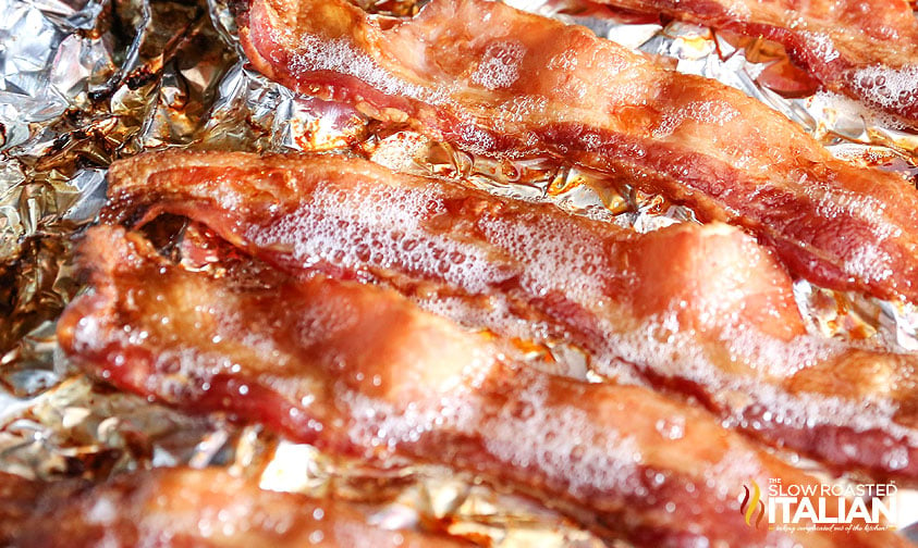 strips of bacon on aluminum foil