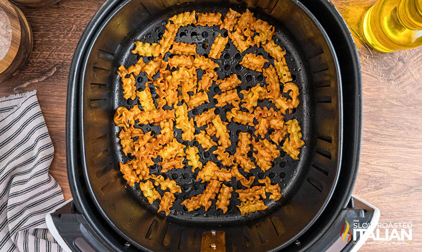 fried pasta chips in air fryer basket