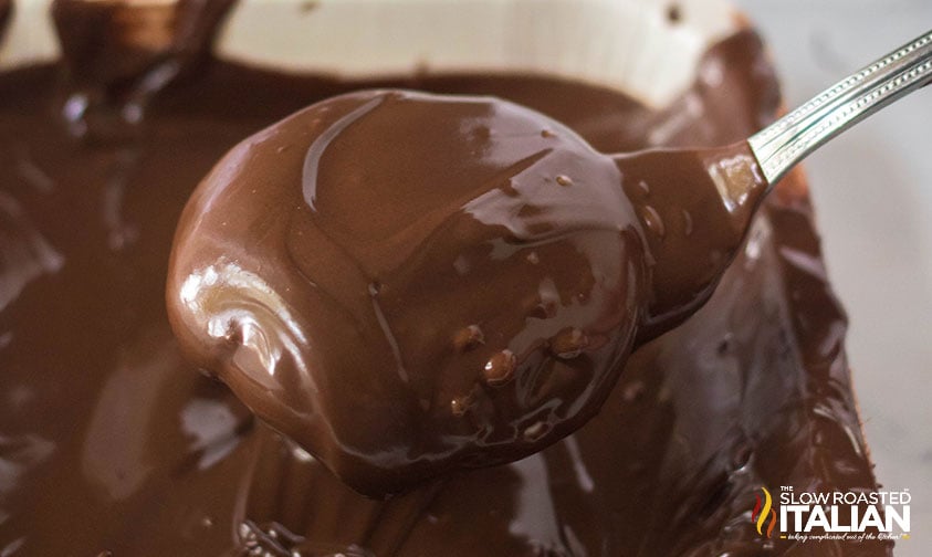dipping peppermint patties into melted chocolate